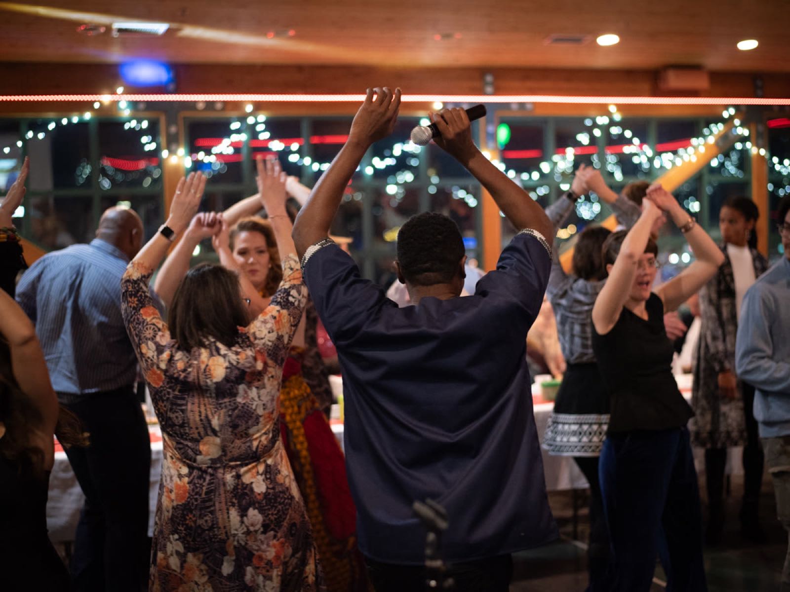 Everyone dancing at our 2023 holiday gala
