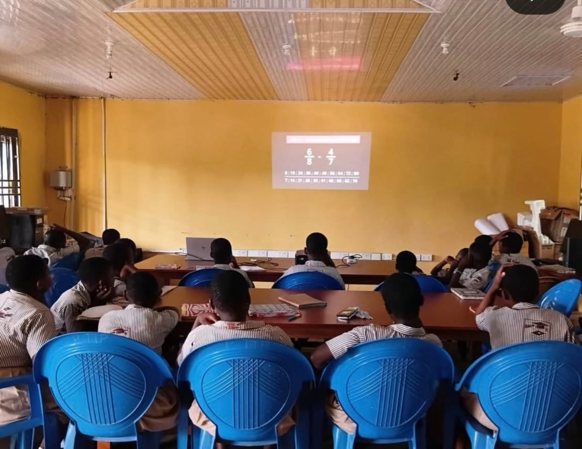 Students in the Dadome STEAM/ICT Lab watching a lesson on screen