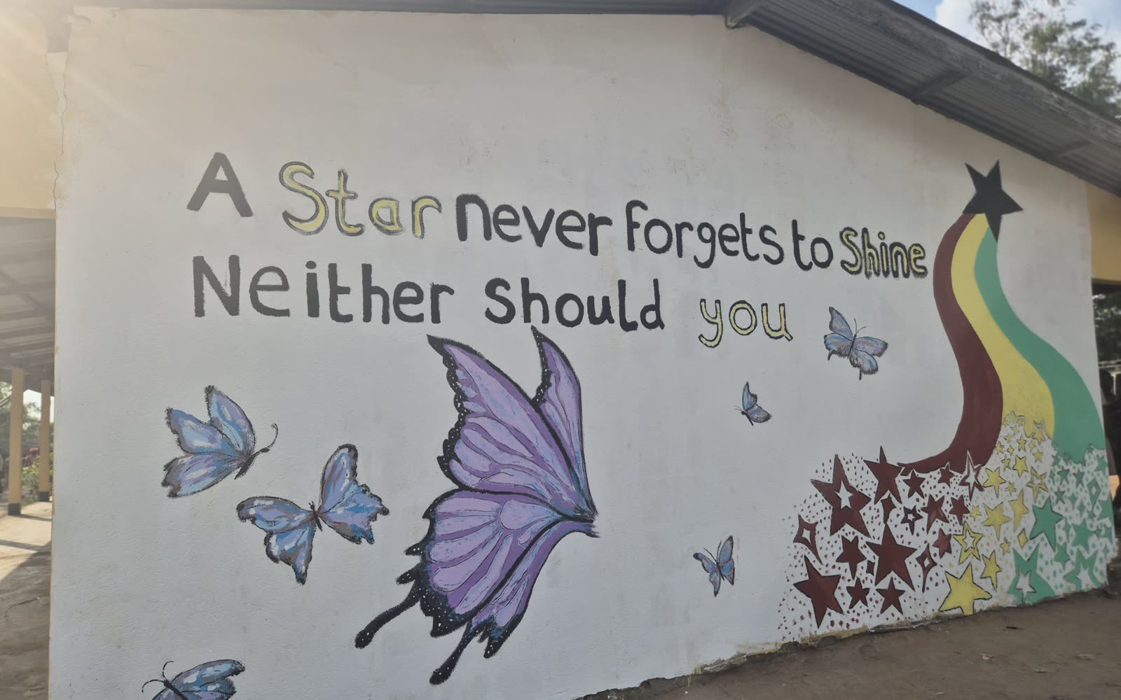 The A Star Never Forgets to Shine mural at a school in Ghana