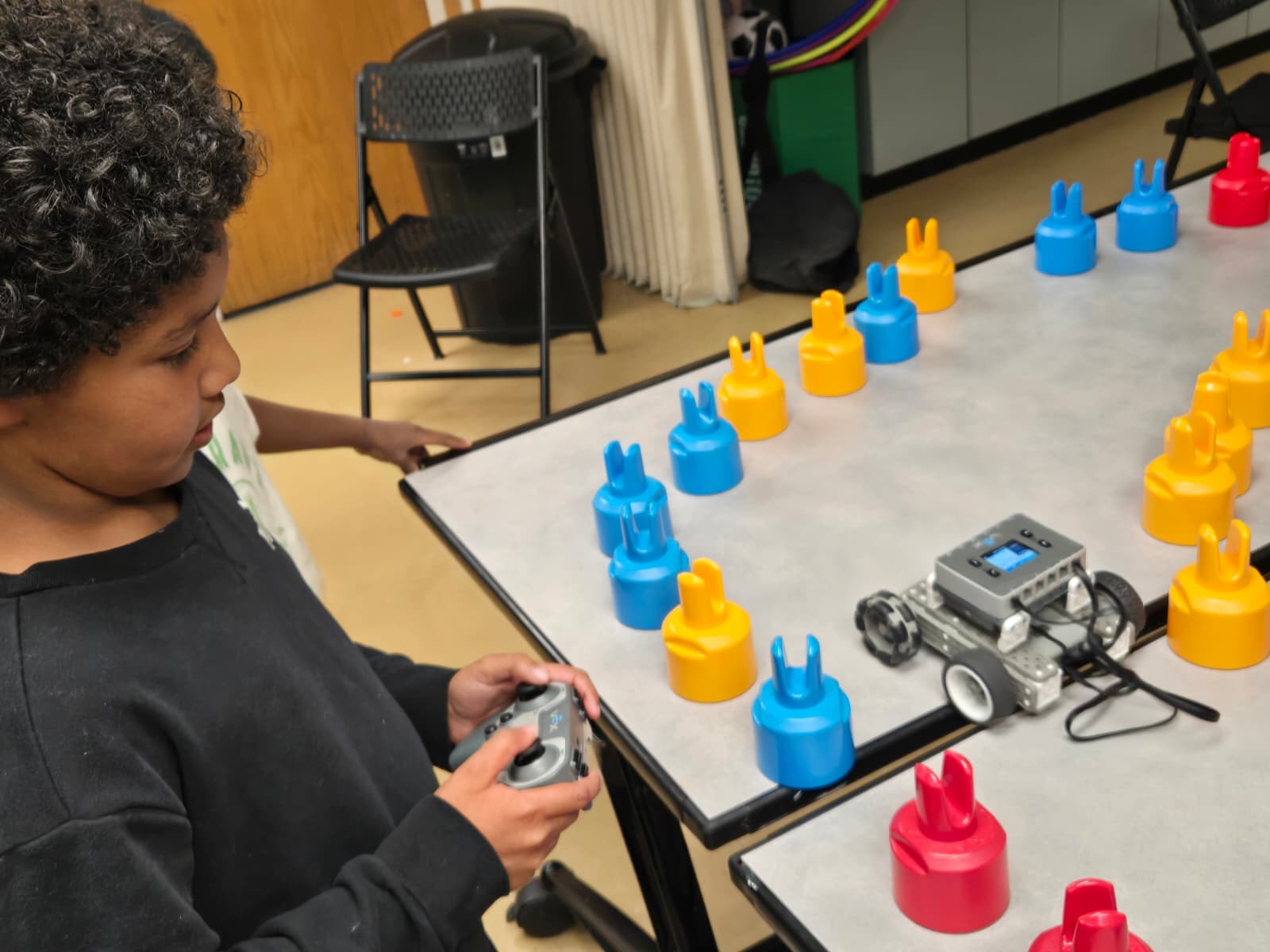 Robot building kits on a classroom table
